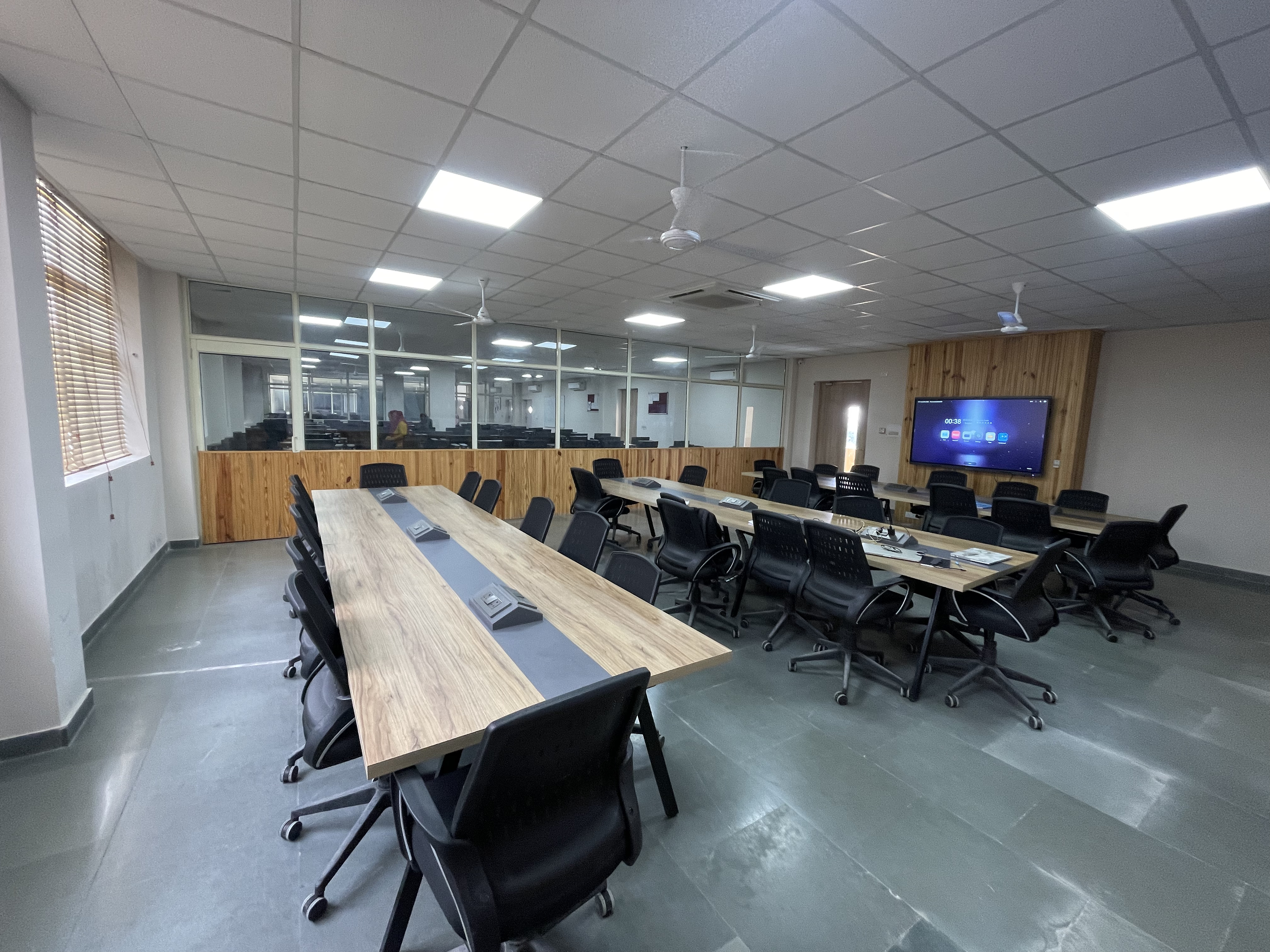 Team ArcLight tournament command room with team seating and display screen